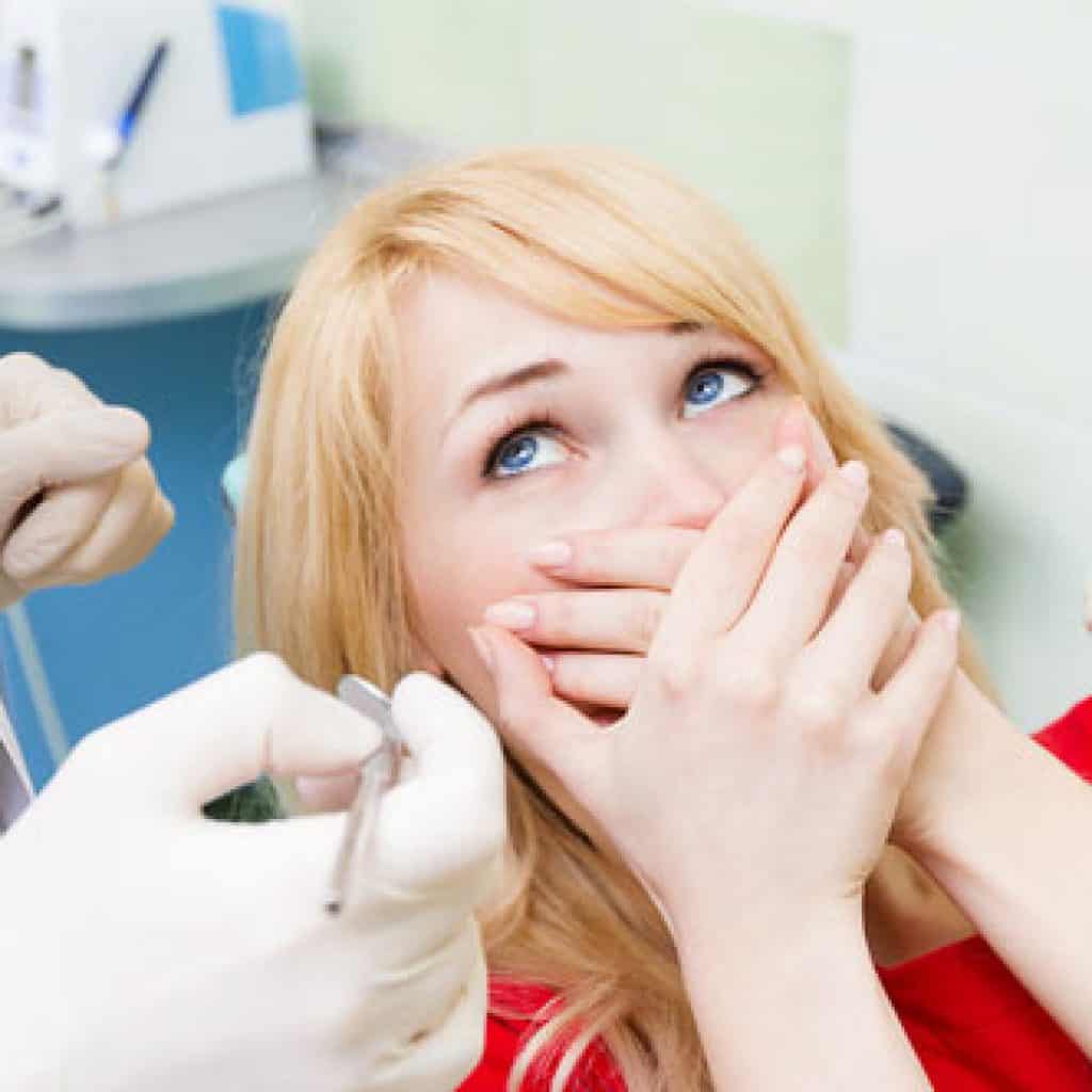 Lady afraid of dental treatments | Dental Anxiety in West Liberty, IA, North Liberty, IA and Muscatine, IA | Gentle Family Dentists