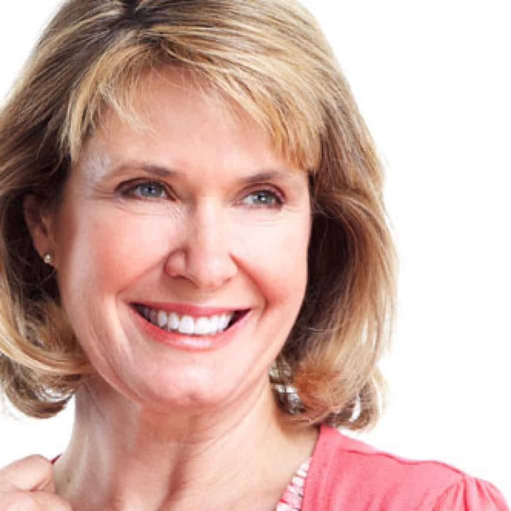 Charming Old Woman Smiling | Dental Crowns and Bridges in West Liberty, IA, North Liberty, IA and Muscatine, IA | Gentle Family Dentists