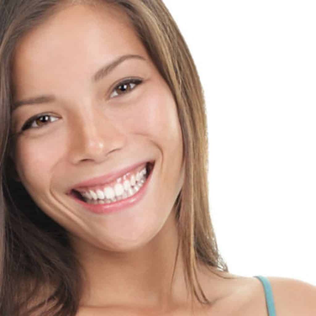 Woman Smiling to Show Her Teeth and Gums | Gum Disease Treatment in West Liberty, IA, North Liberty, IA and Muscatine, IA | Gentle Family Dentists