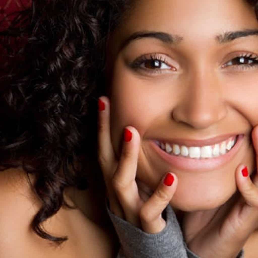 Confident Young Lady Beaming | Gum Reshaping in West Liberty, IA, North Liberty, IA and Muscatine, IA | Gentle Family Dentists