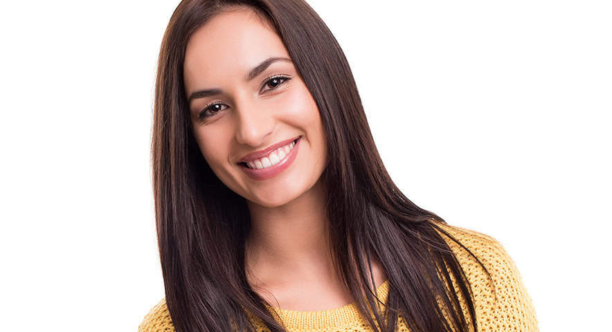 Happy Young Lady | Root Canal in West Liberty, IA | Gentle Family Dentists | Dr. Carol Moreno