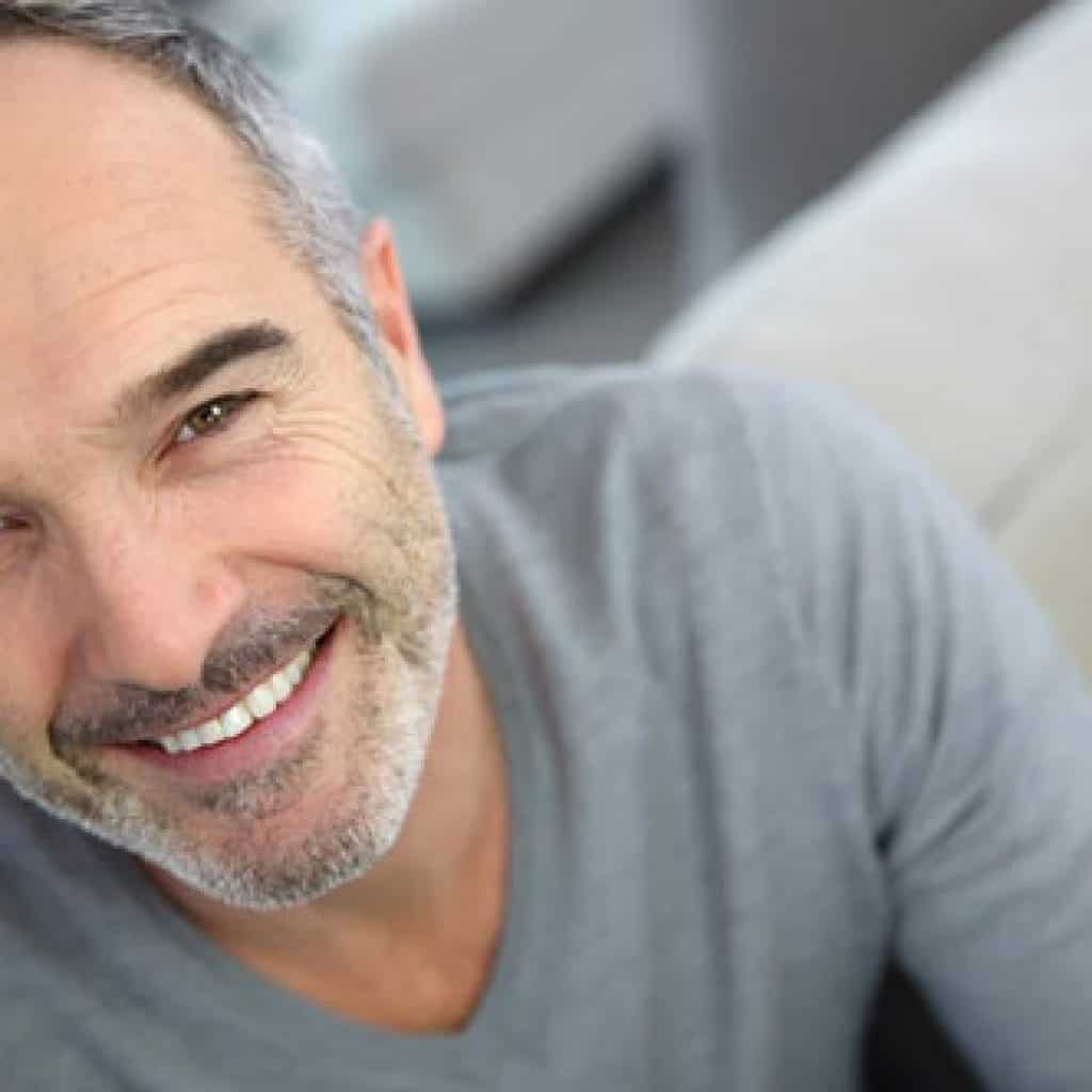 Matured-Looking Man Smiling | West Liberty, IA, North Liberty, IA and Muscatine, IA | Gentle Family Dentists