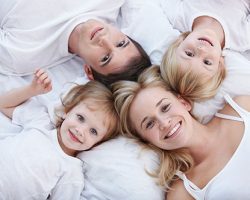 Playful Family Picture | Full-Mouth Reconstruction in West Liberty, IA, North Liberty, IA and Muscatine, IA | Gentle Family Dentists