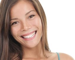 Woman Smiling to Show Her Teeth and Gums | Gum Disease Treatment in West Liberty, IA, North Liberty, IA and Muscatine, IA | Gentle Family Dentists