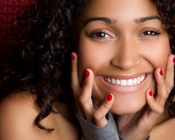 Confident Young Lady Beaming | Gum Reshaping in West Liberty, IA, North Liberty, IA and Muscatine, IA | Gentle Family Dentists