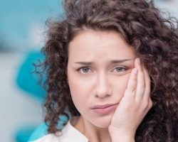 Young Lady Suffering from Toothache | West Liberty, IA, North Liberty, IA and Muscatine, IA | Gentle Family Dentists