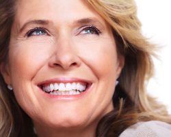 Old Woman showing a fulfilling smile | West Liberty, IA, North Liberty, IA and Muscatine, IA | Gentle Family Dentists