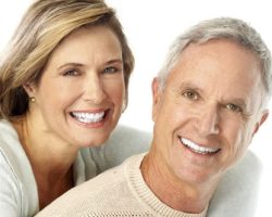 Beaming Couple | West Liberty, IA, North Liberty, IA and Muscatine, IA | Gentle Family Dentists