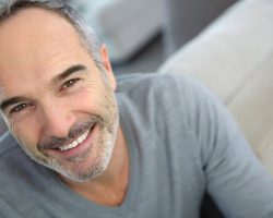 Matured-Looking Man Smiling | West Liberty, IA, North Liberty, IA and Muscatine, IA | Gentle Family Dentists